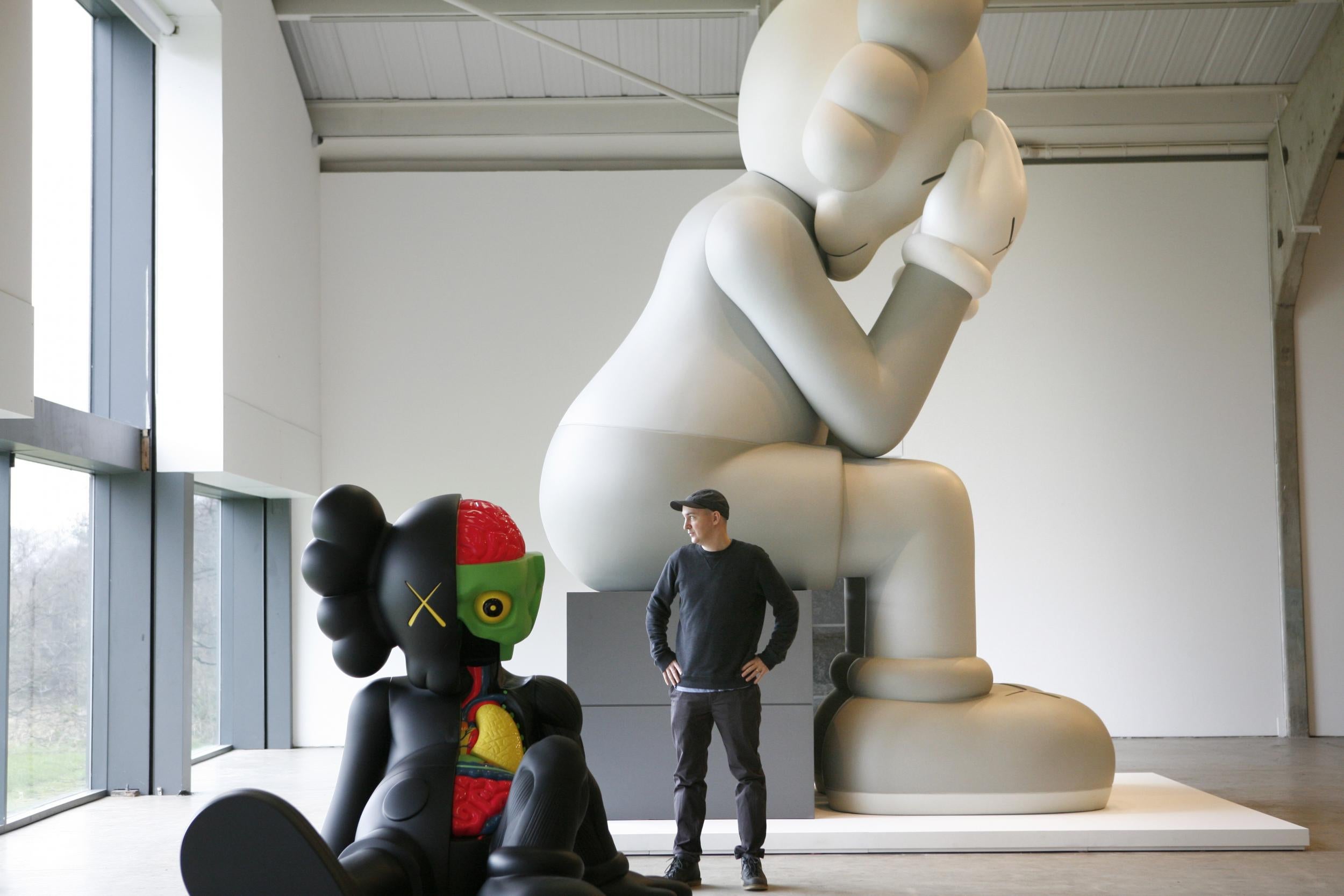 Pop artist KAWS' gigantic cartoon sculptures will be taking over